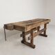Wooden industrial workbench with vice, 194 cm long, 1930s.