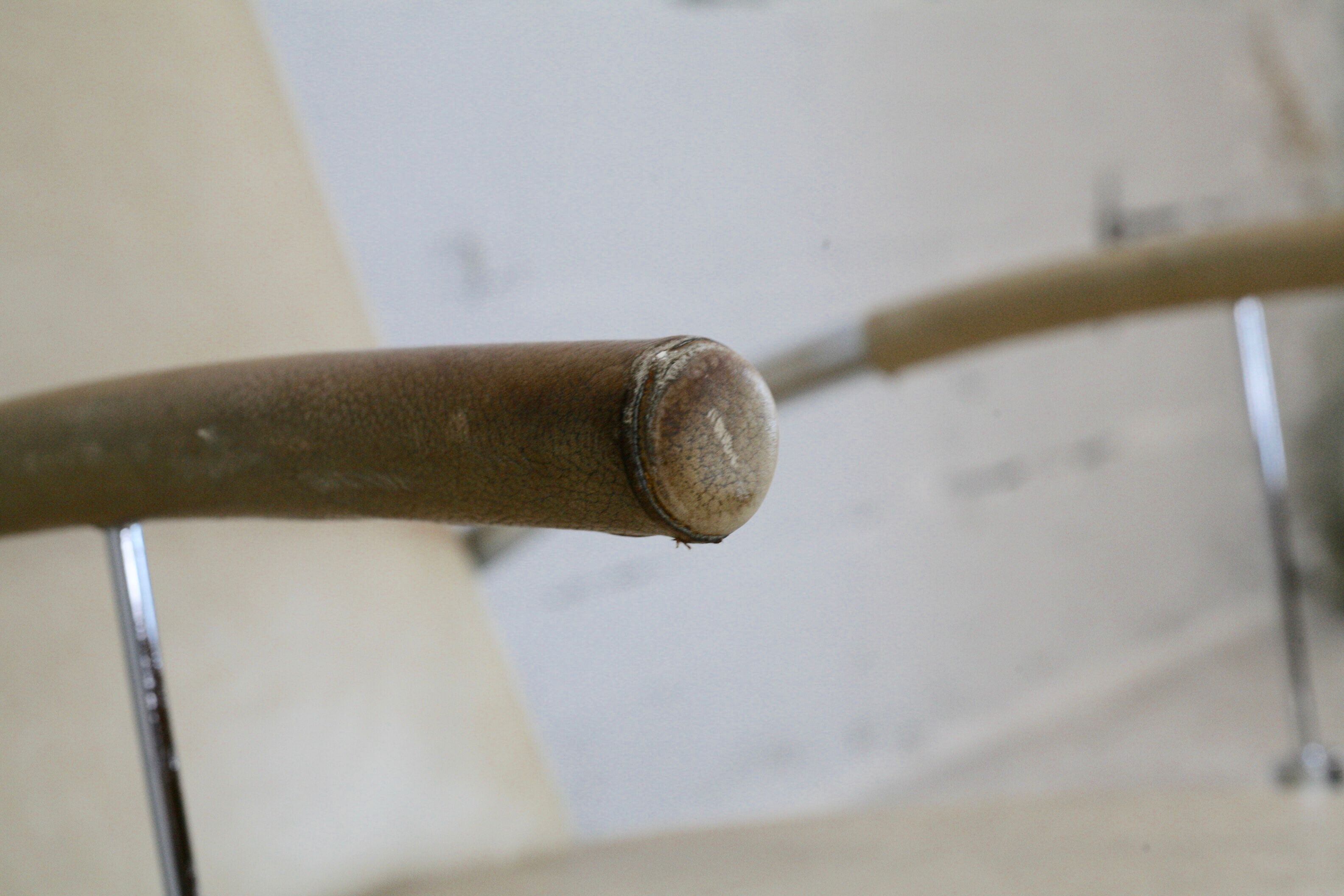 Tubular steel armchair and "cream" leather, France, circa 1970