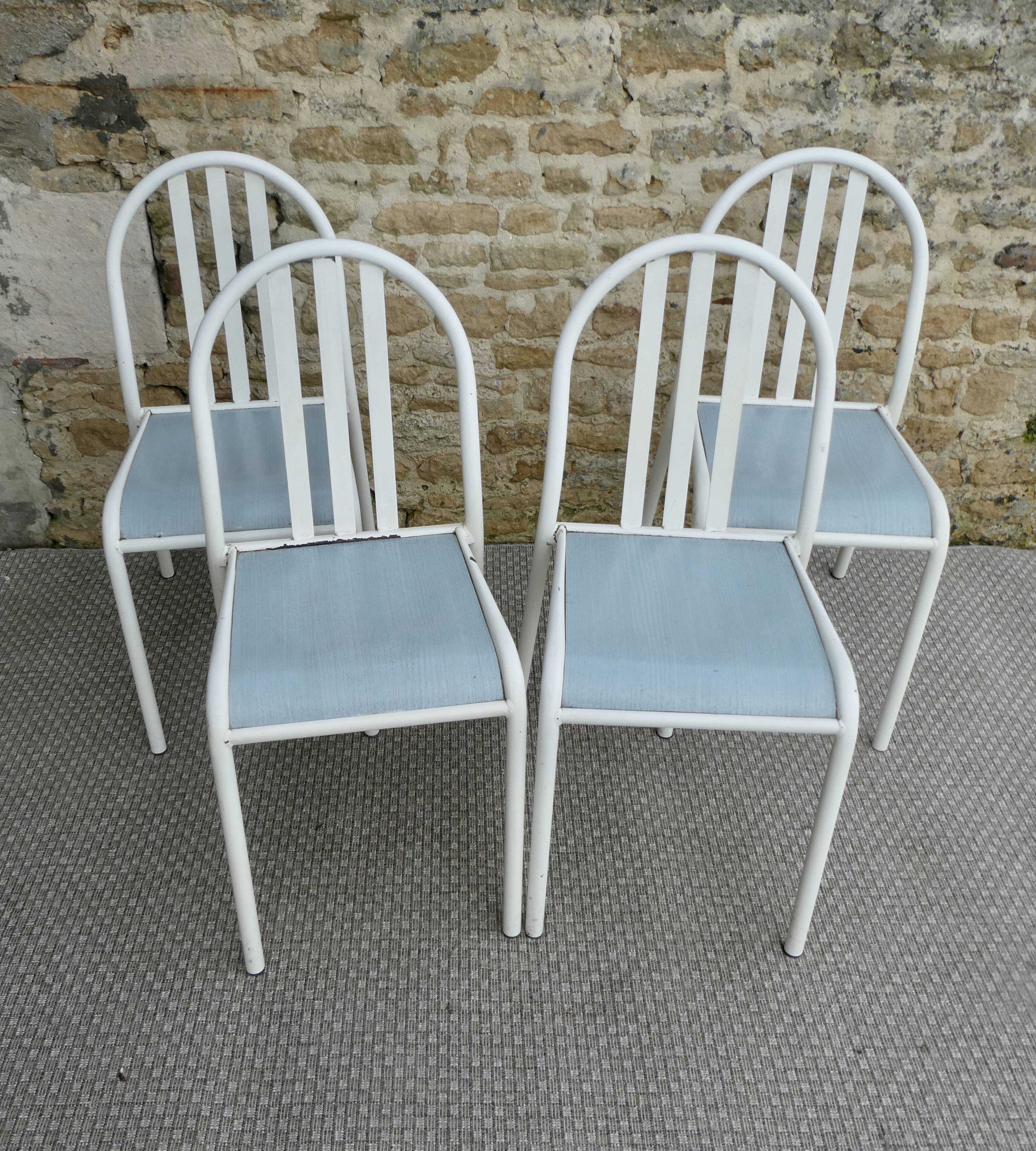 Set of 4 chairs by Robert Mallet-Stevens, 1960s.