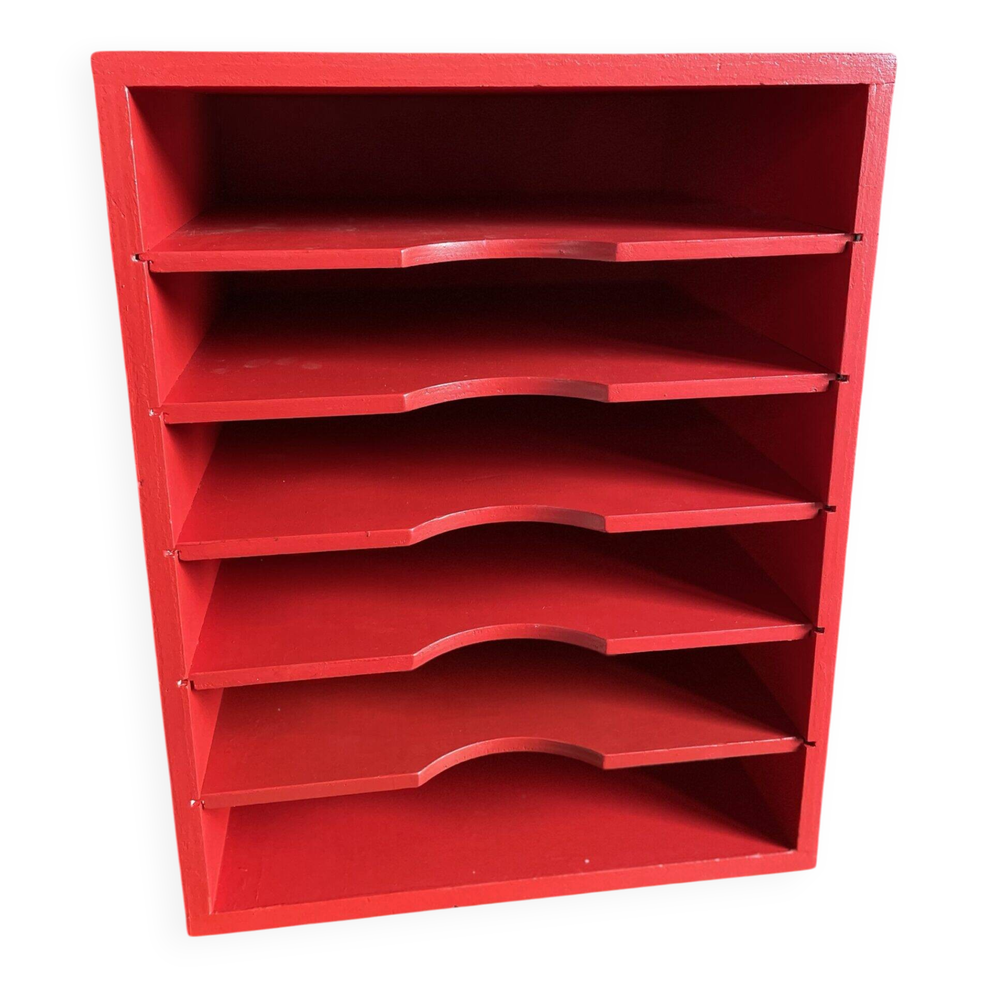 Vintage wooden magazine rack in red.