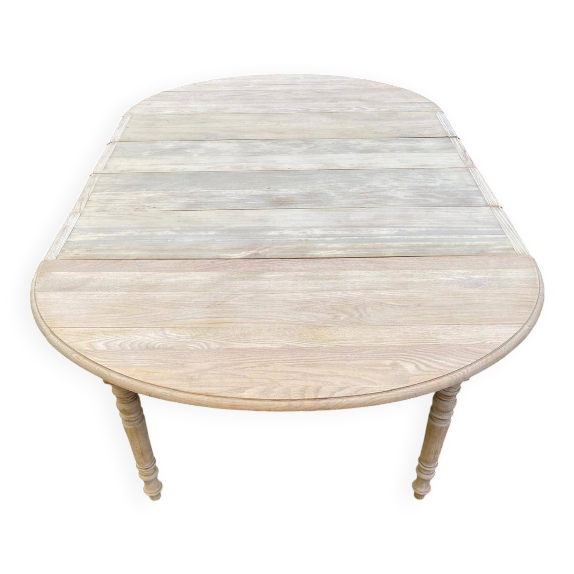 Renovated Louis Philippe round extendable dining table with 4 leaves.