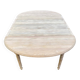 Renovated Louis Philippe round extendable dining table with 4 leaves.