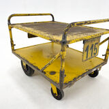 Vintage industrial coffee or side table on wheels