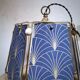 Table lamp, old turned wooden foot, metal lampshade and art deco print