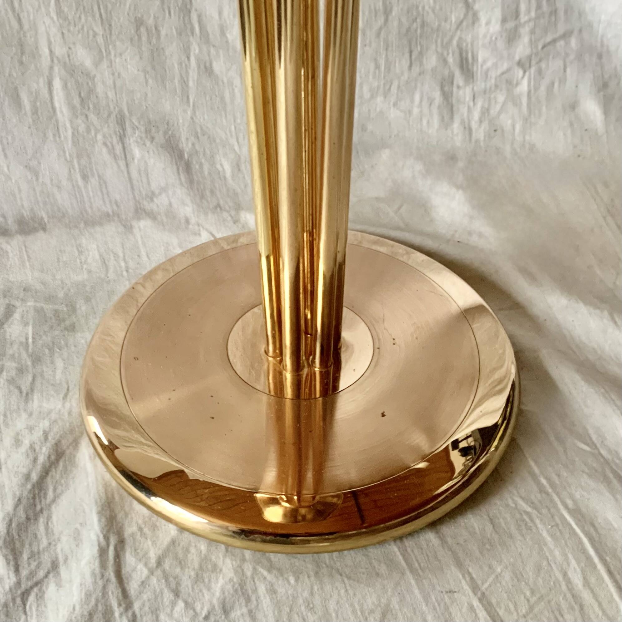 Old brass and chrome-plated metal ashtray on stand