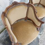 Pair of armchairs basket louis XV in carved walnut