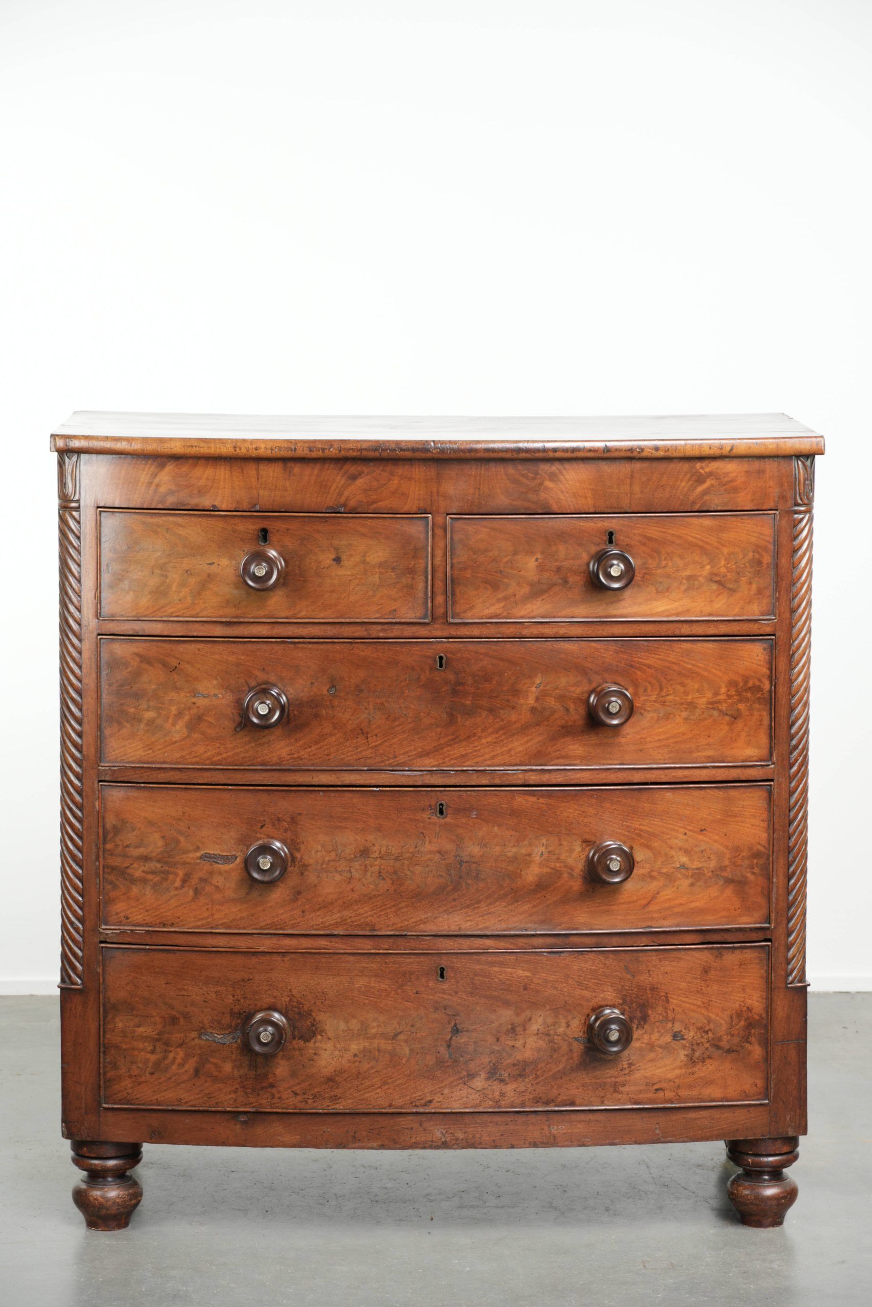 Antique 19th century English chest of drawers/commode with bow front