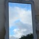 Antique Louis XV style mirror in solid oak with grey patina, 131cm.