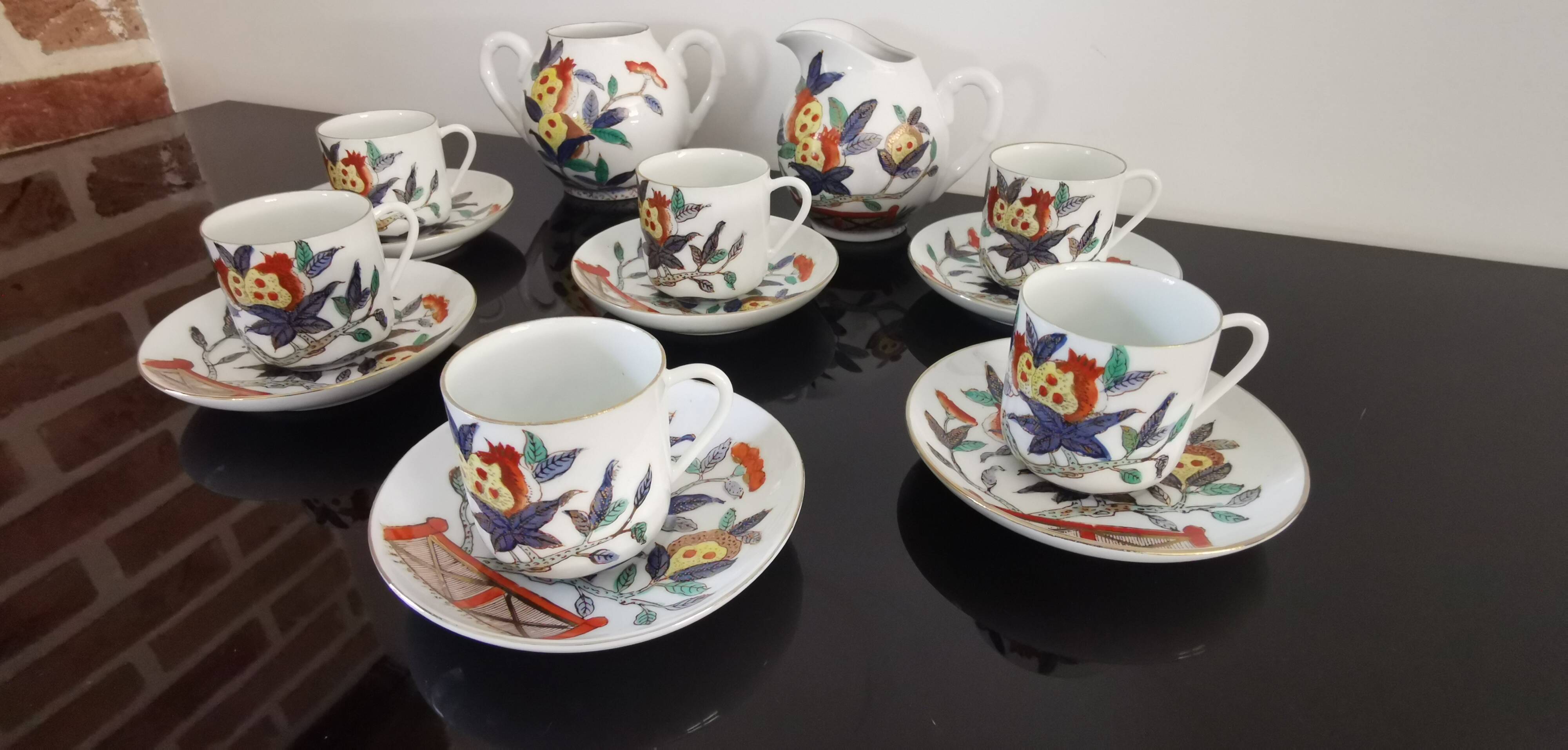 Set of 6 porcelain cups, 6 saucers, teapot and milk jug