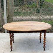 Louis Philippe oval table with shutters, 19th century, solid oak wood, twisted leg