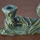 Pair of iridescent green ceramic Art Deco candlesticks