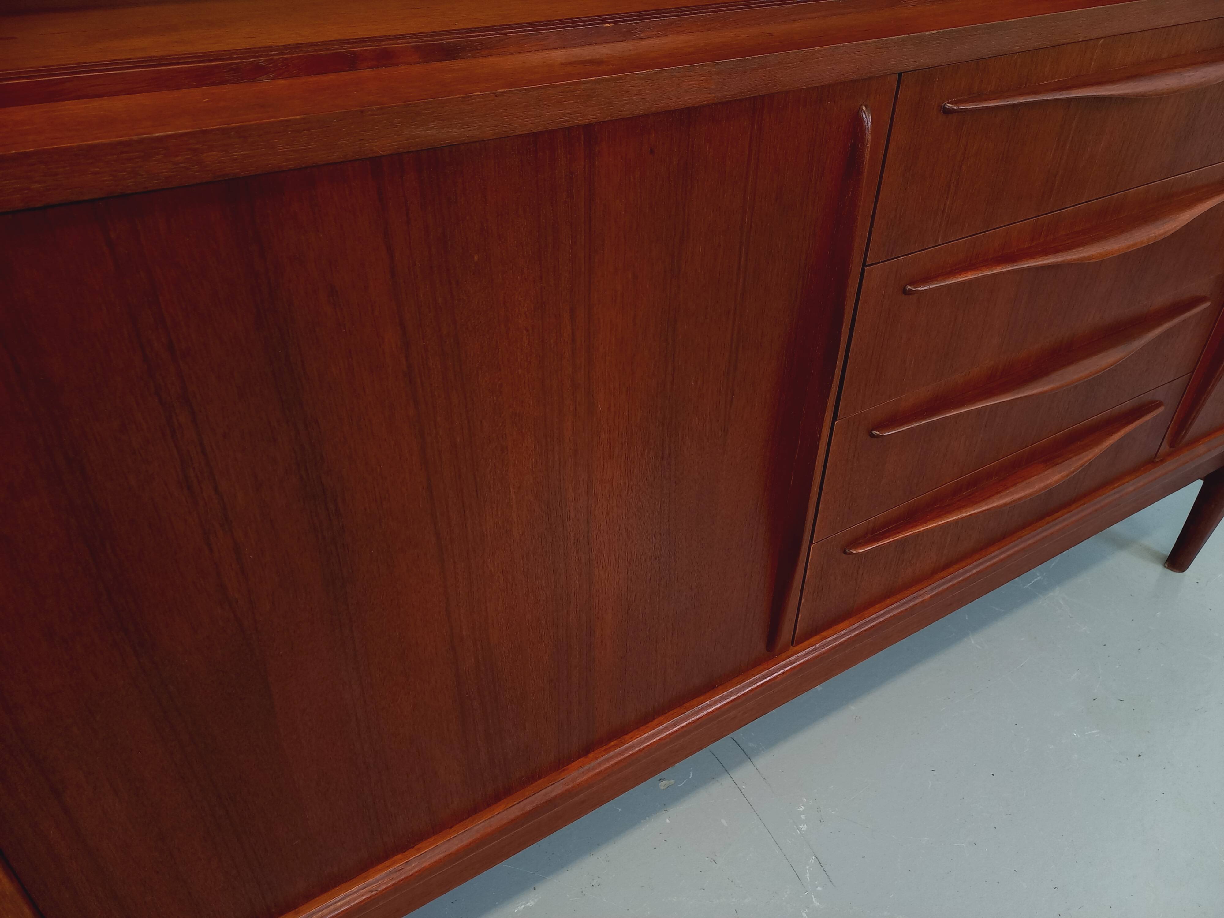 Vintage Scandinavian high sideboard in teak from the 50s and 60s