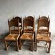Set of 6 sculpted oak chairs with straw seats – 1950s