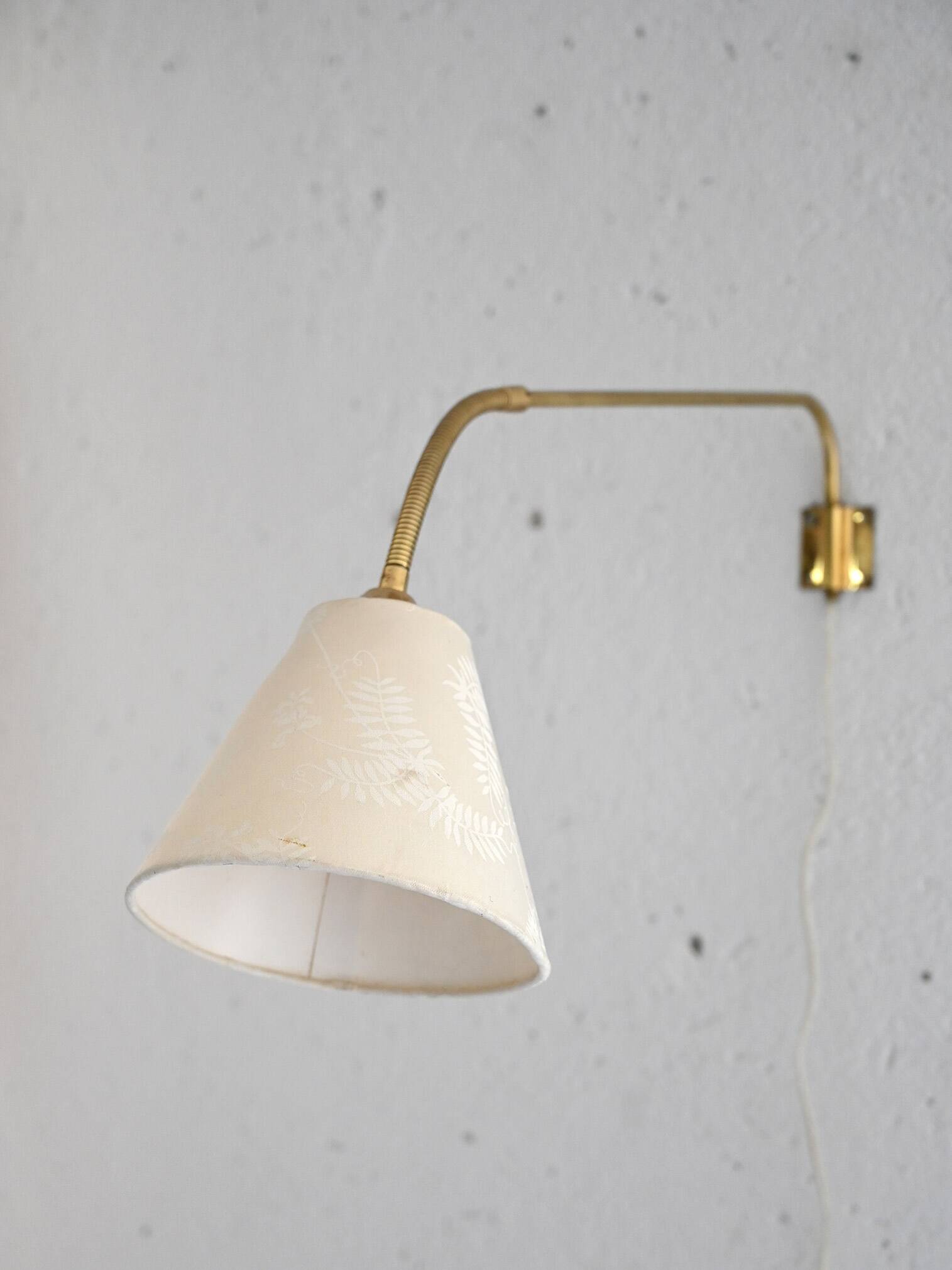 Vintage wall light in gold metal and cotton