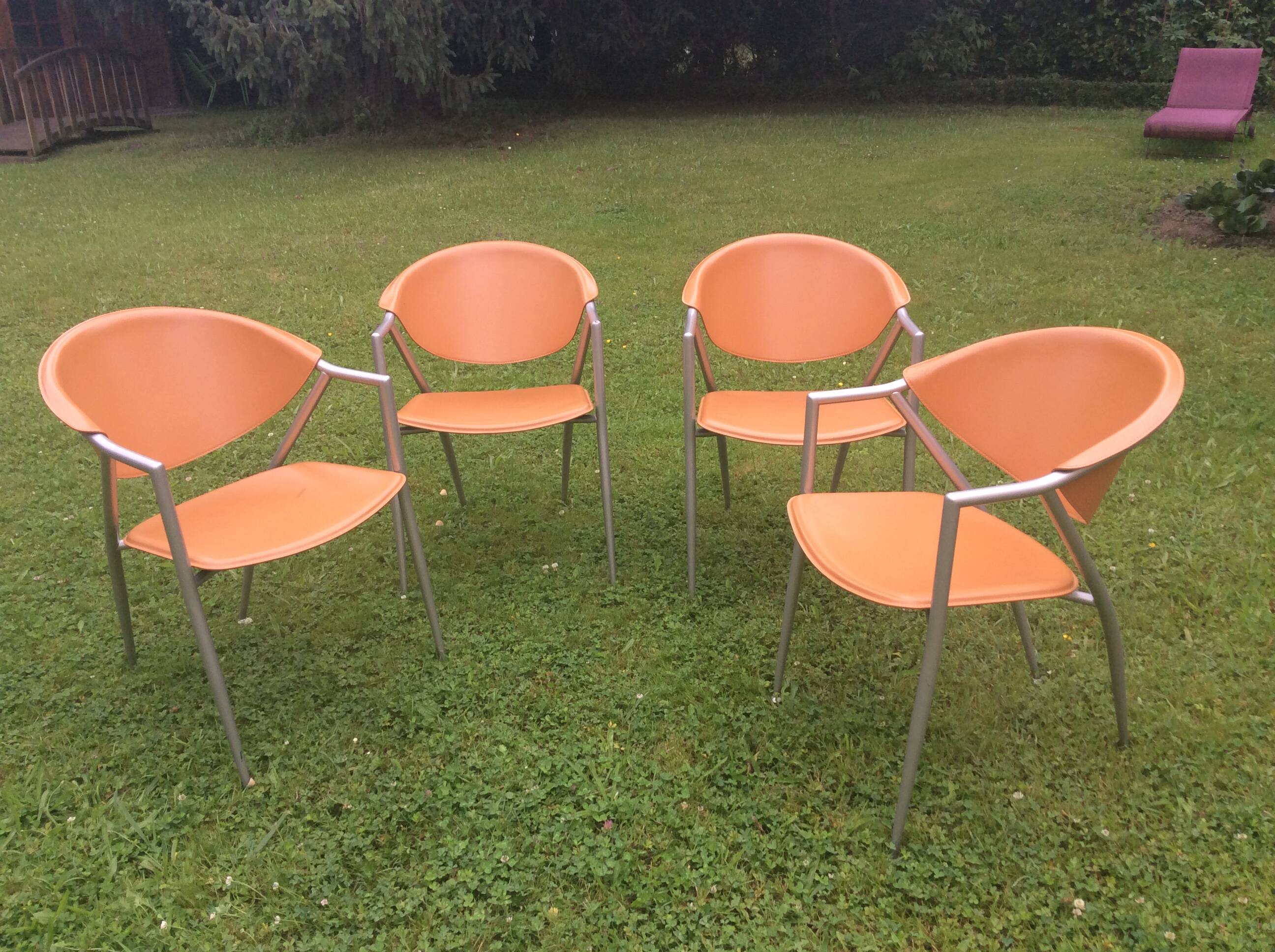 Leather and metal armchairs