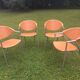 Leather and metal armchairs