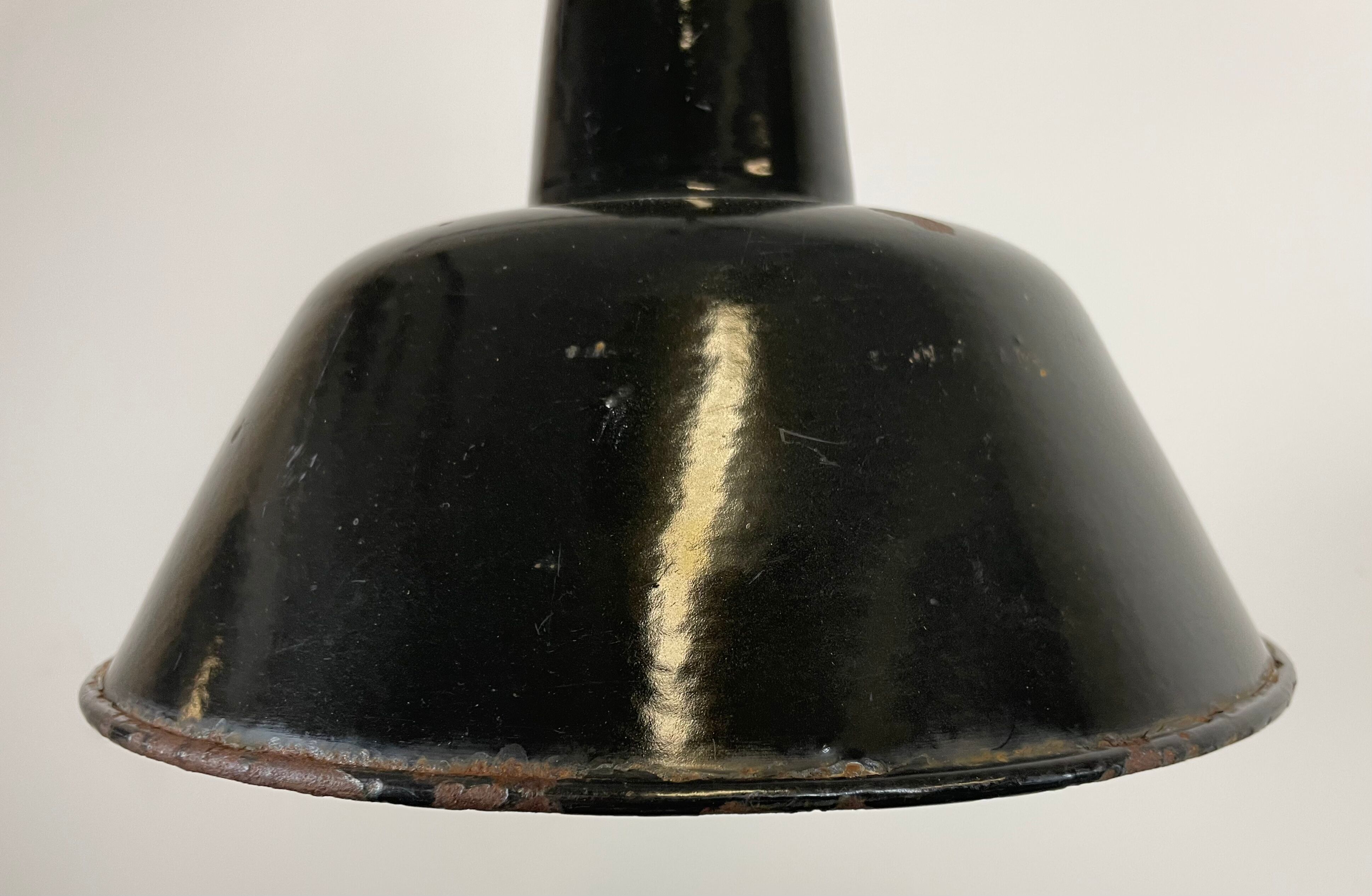 Industrial black enamel factory lamp with cast iron top, 1950s