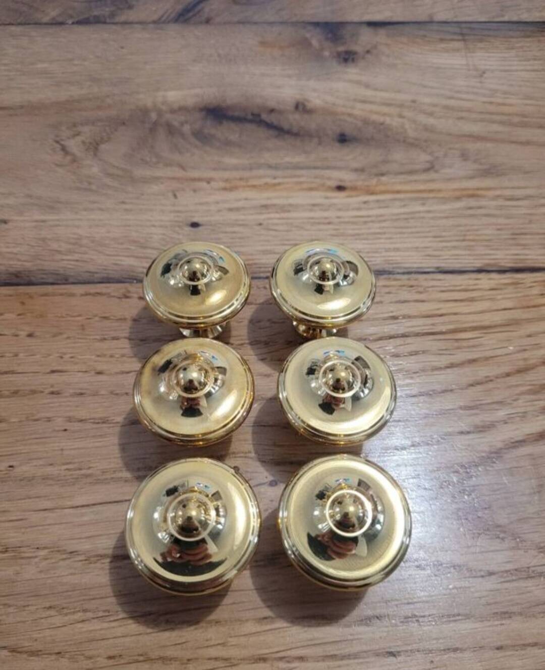 6 polished brass furniture knobs