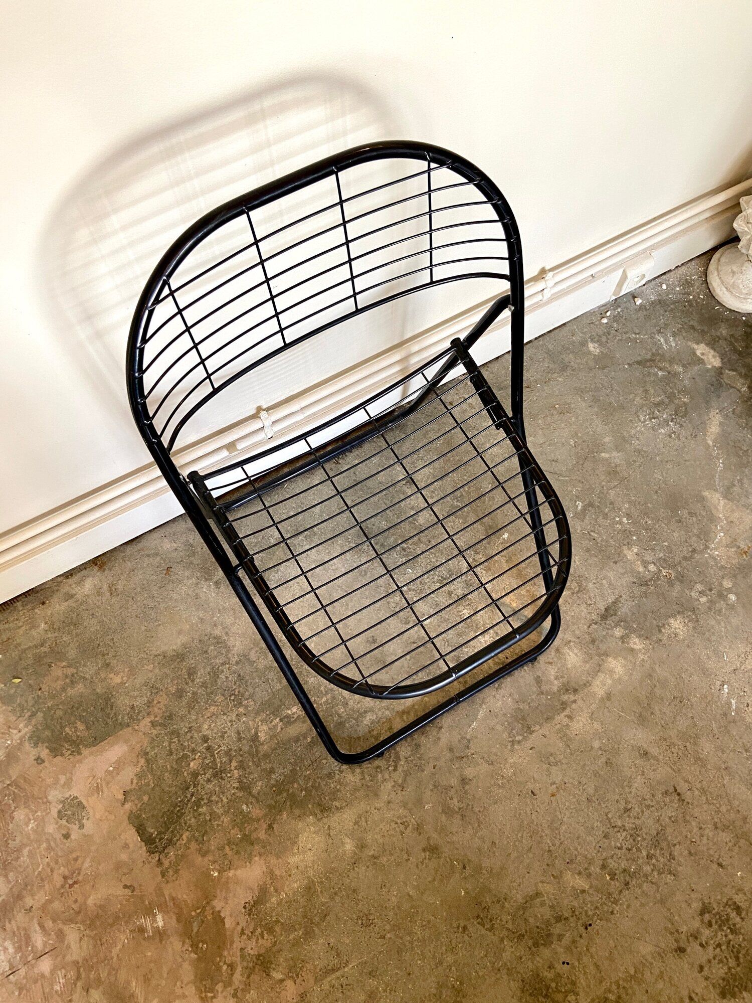 Black metal folding chair