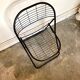 Black metal folding chair