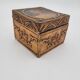 Old jewelry box in wood and gilded stucco