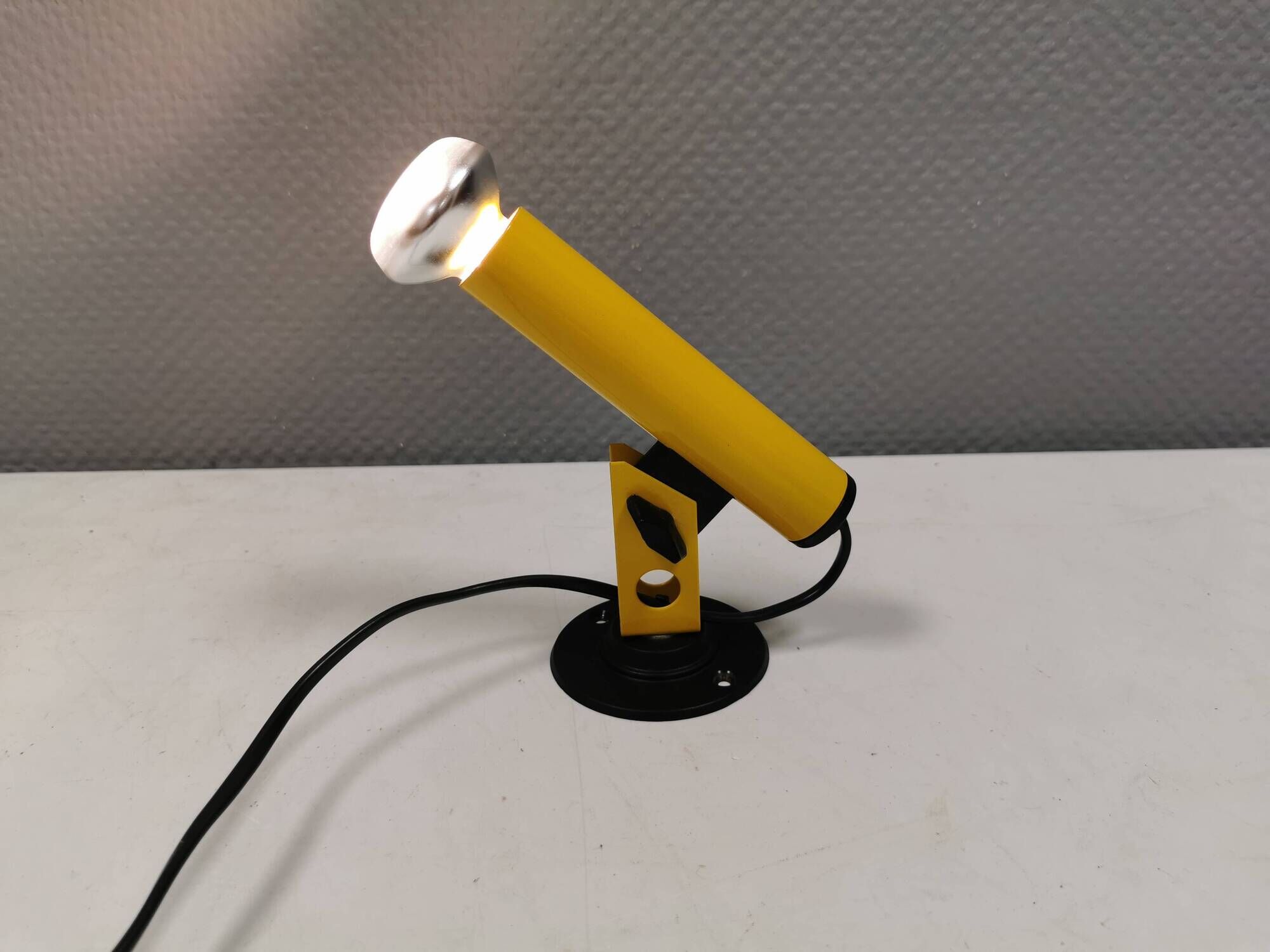Small wall lamp in beautiful yellow color from Danish Nordlux 1980s.
