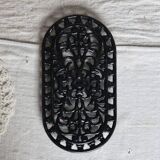 Vintage black cast iron oval trivet - Openwork design