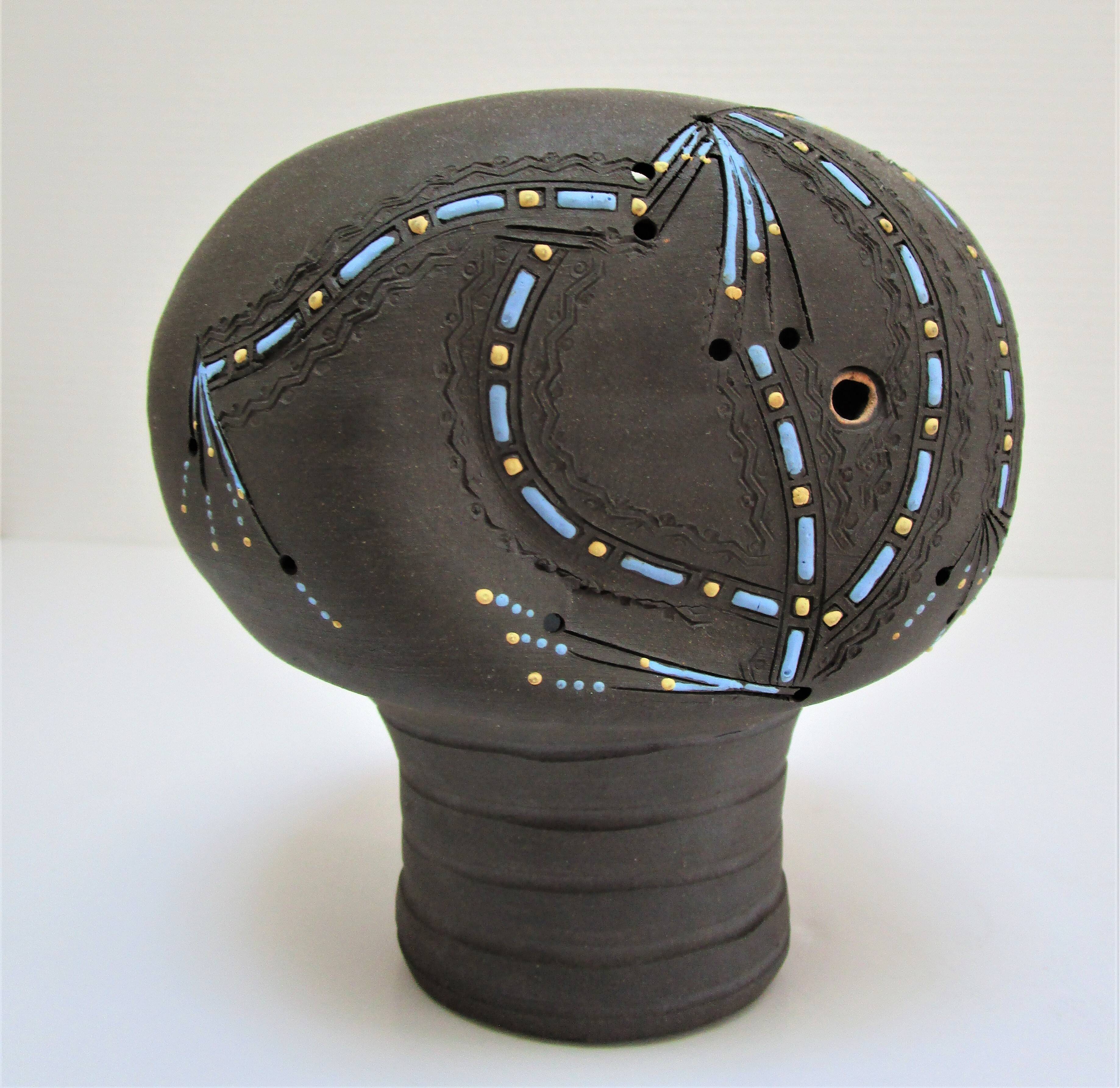 Anthropomorphic candle holder, scarified ceramic, stamped design