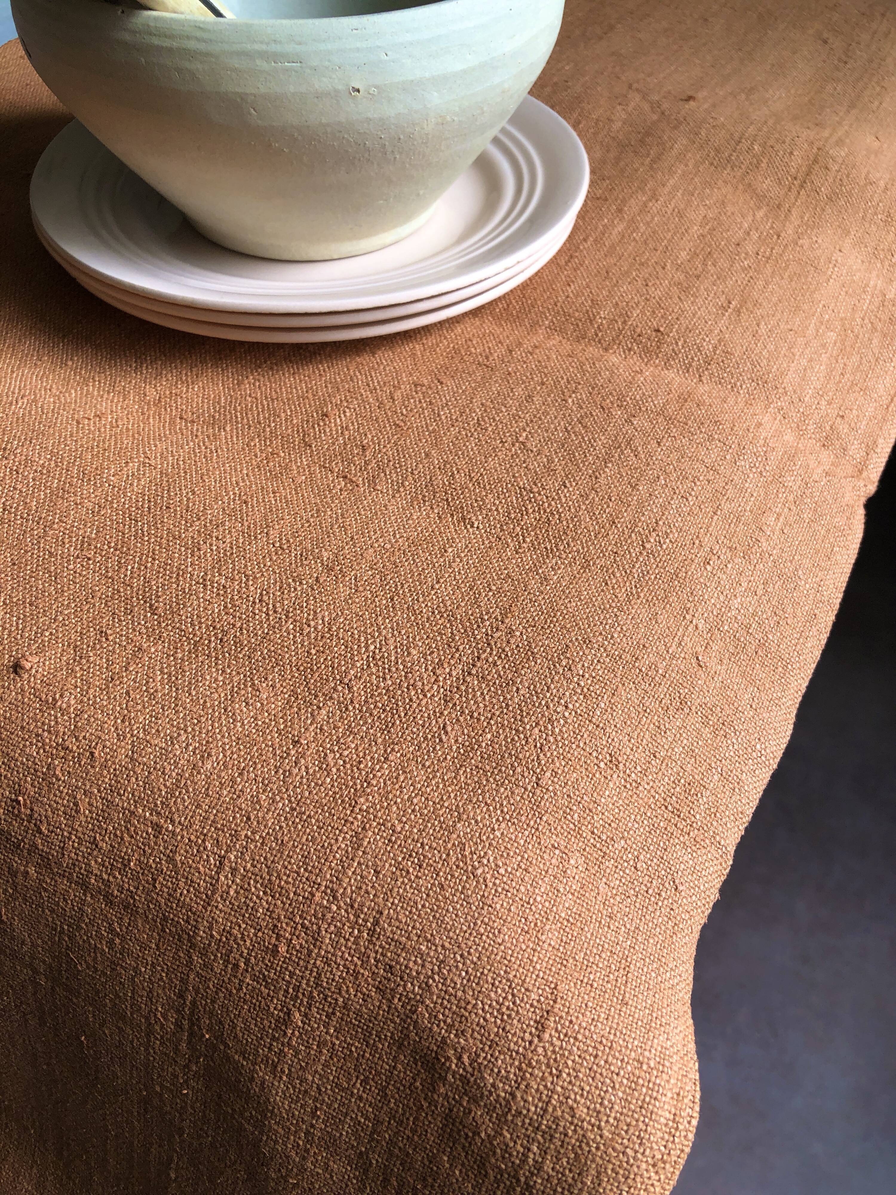 Old harvest tablecloth in terracotta tinted hemp