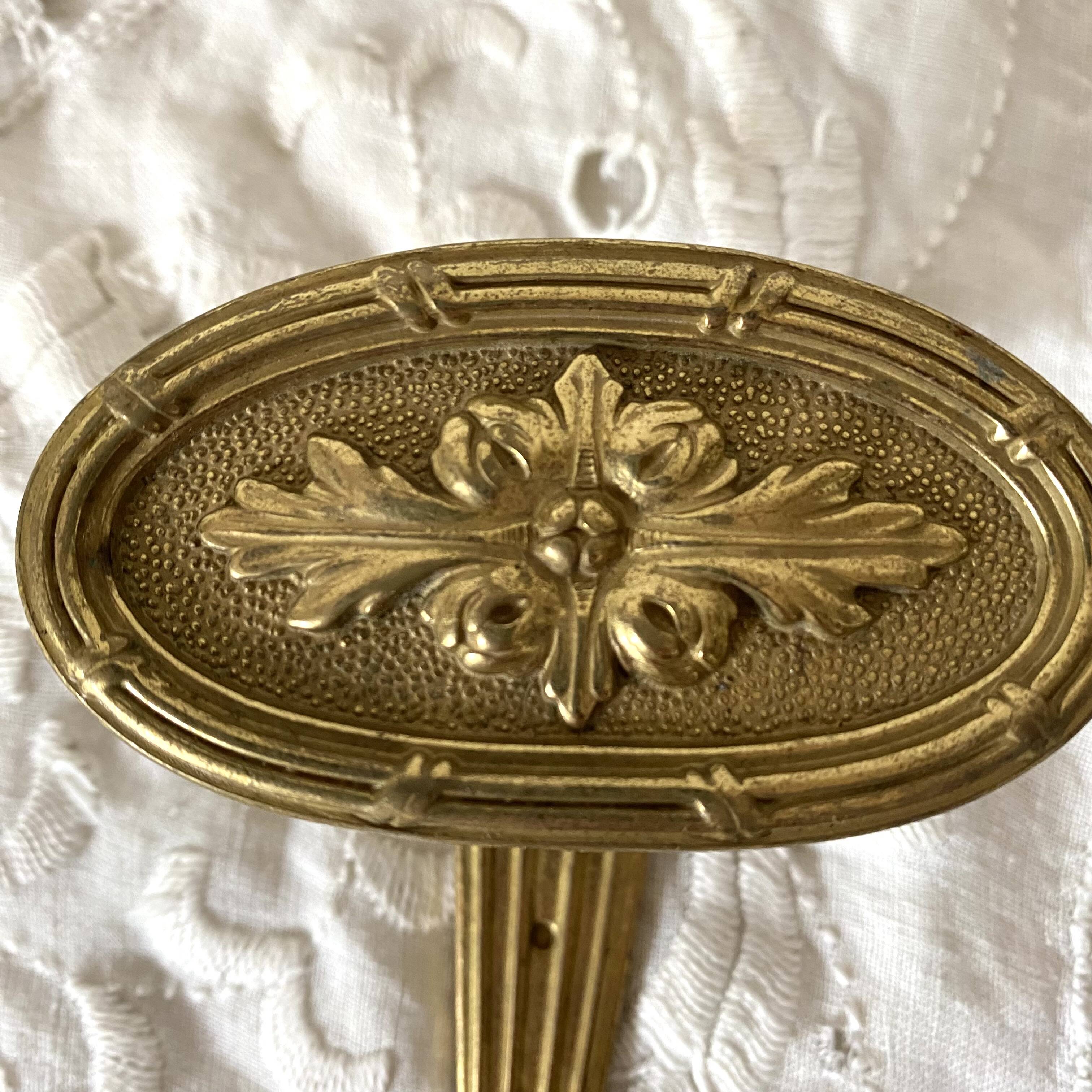 Golden brass coat hook