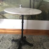 Bistro table in white marble and cast iron