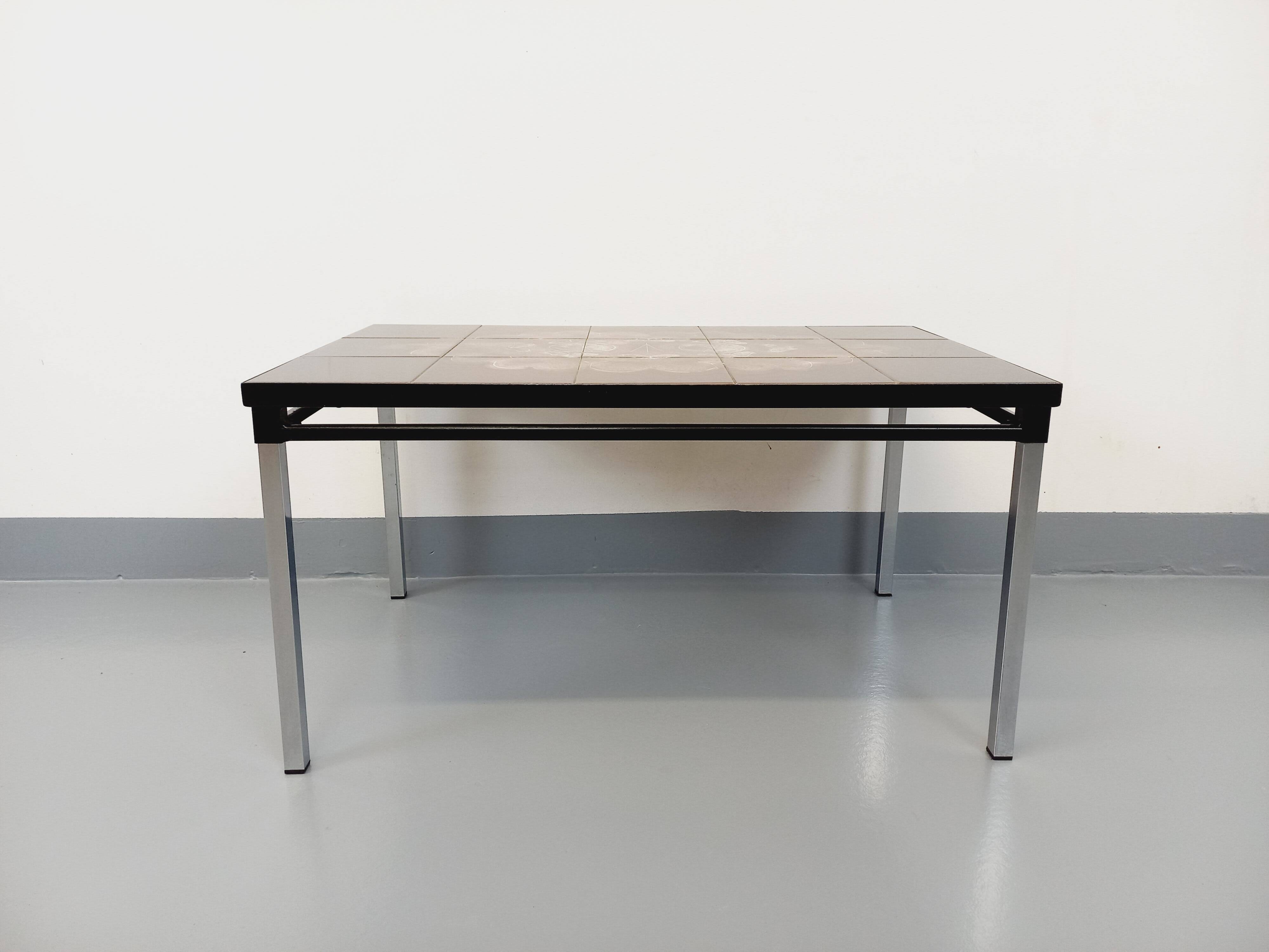 Vintage rectangular coffee table from the 60s 70s in ceramic, black metal and chrome metal