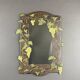 Miroir en bois sculpté à décor de vigne, XXème siècle