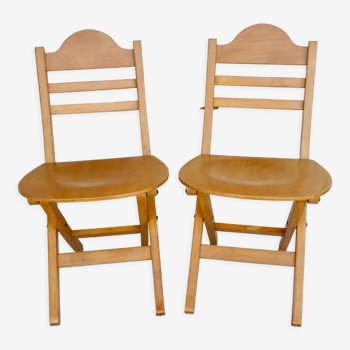 Paire de chaises pliantes en bois clair