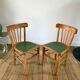 Pair of bistro chairs in light curved wood and green seat 1950s