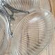 Vintage glass serving tray with silver-plated handle.