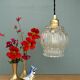 Suspension globe vintage en verre