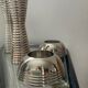 Series of 8 vintage candlesticks in silver metal