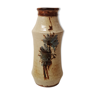 Enamelled sandstone vase with flowers