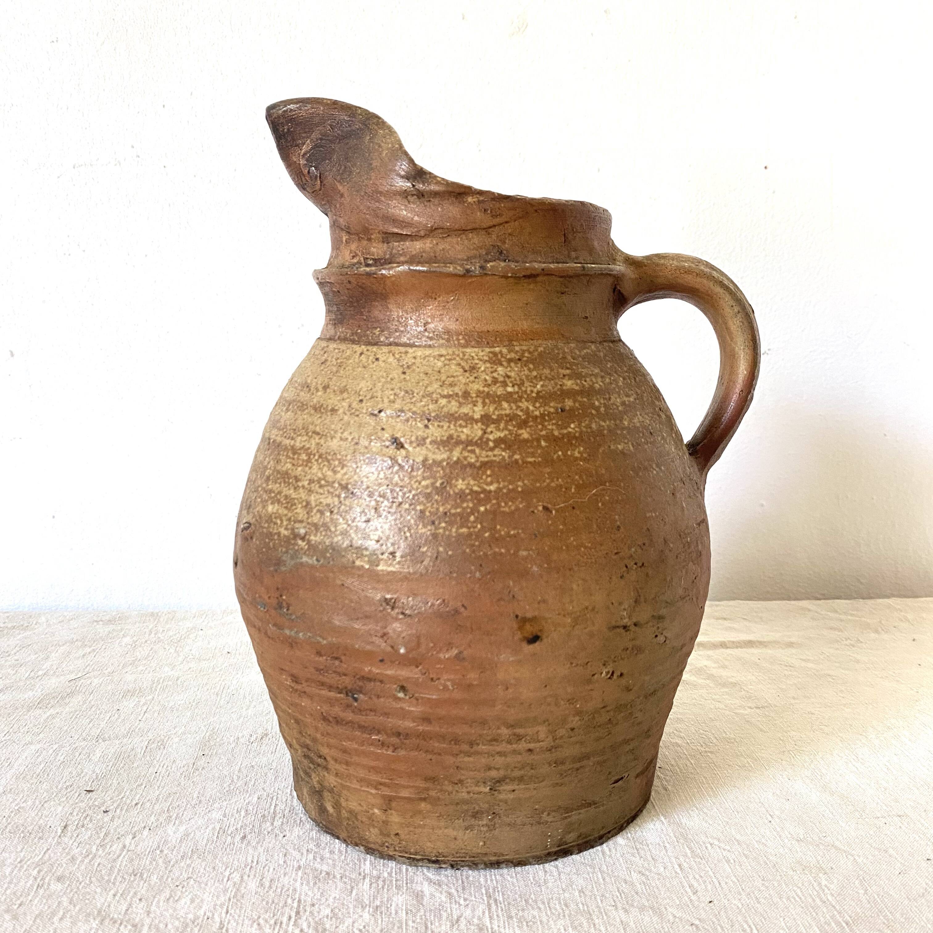 Antique terracotta pitcher