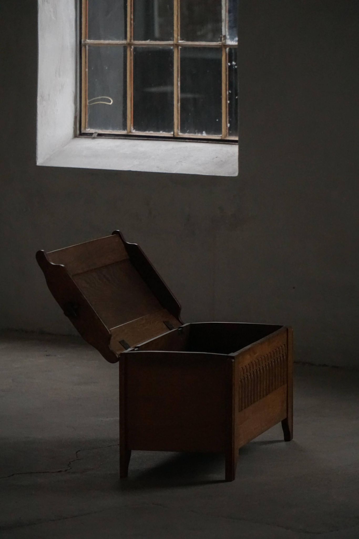 Modern Danish oak commode with decorative relief sculpture, mid-20th century.