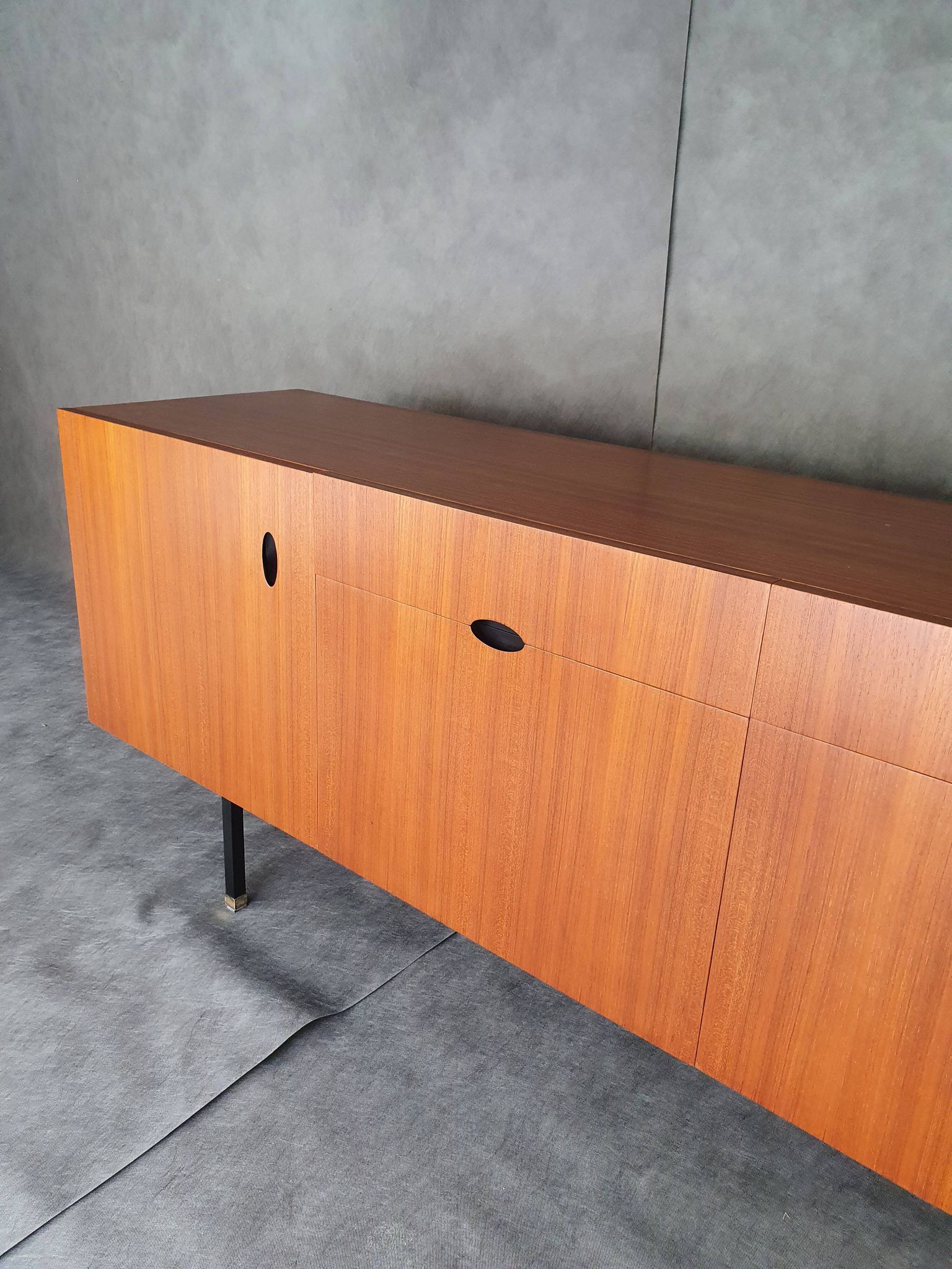 Minimalist mahogany veneer row by Paul Geoffroy 1960s