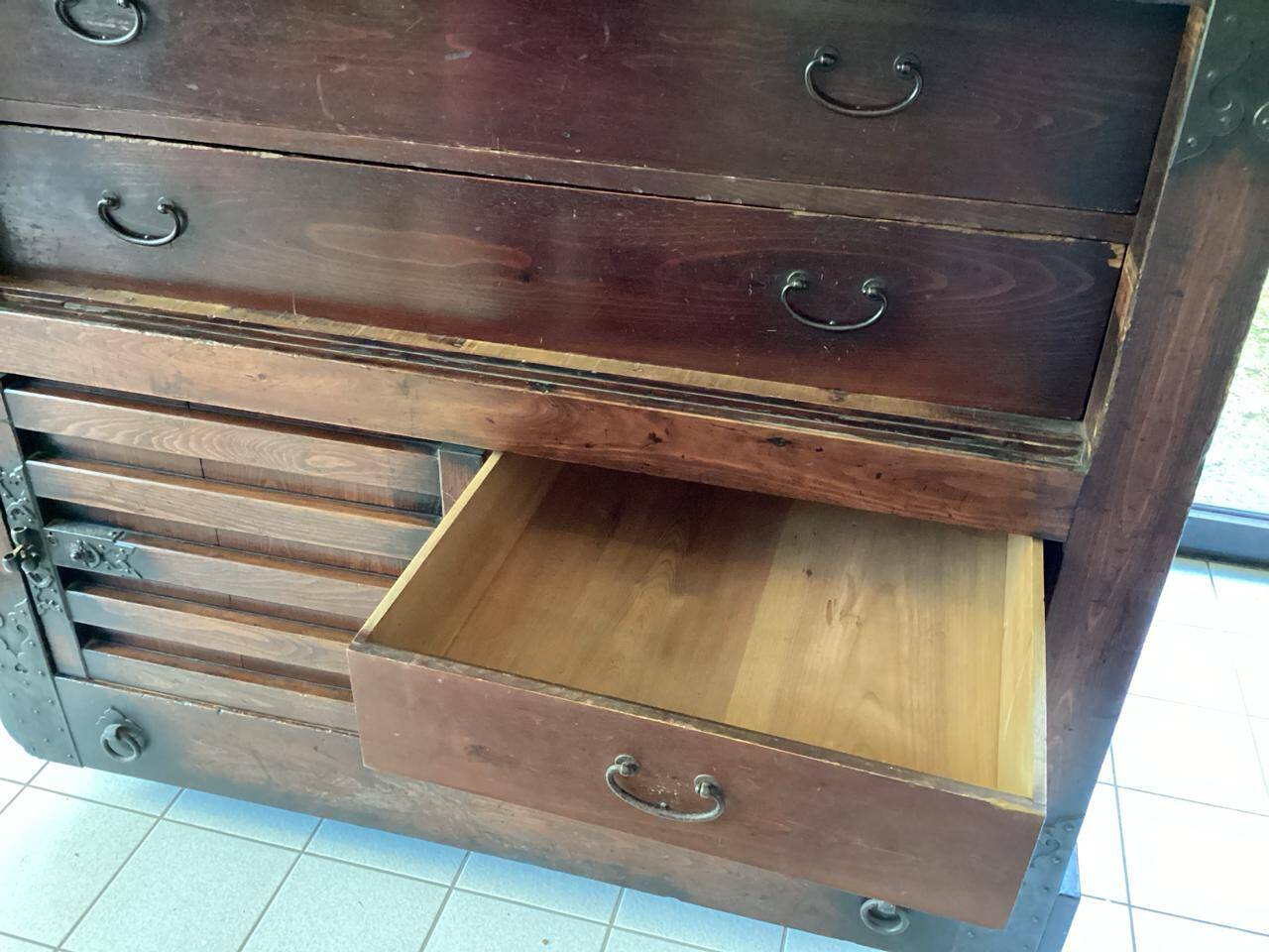 Japanese antique wooden chest with black fittings.