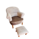 Pair of beige bouclette fabric frog chairs and their footrest.