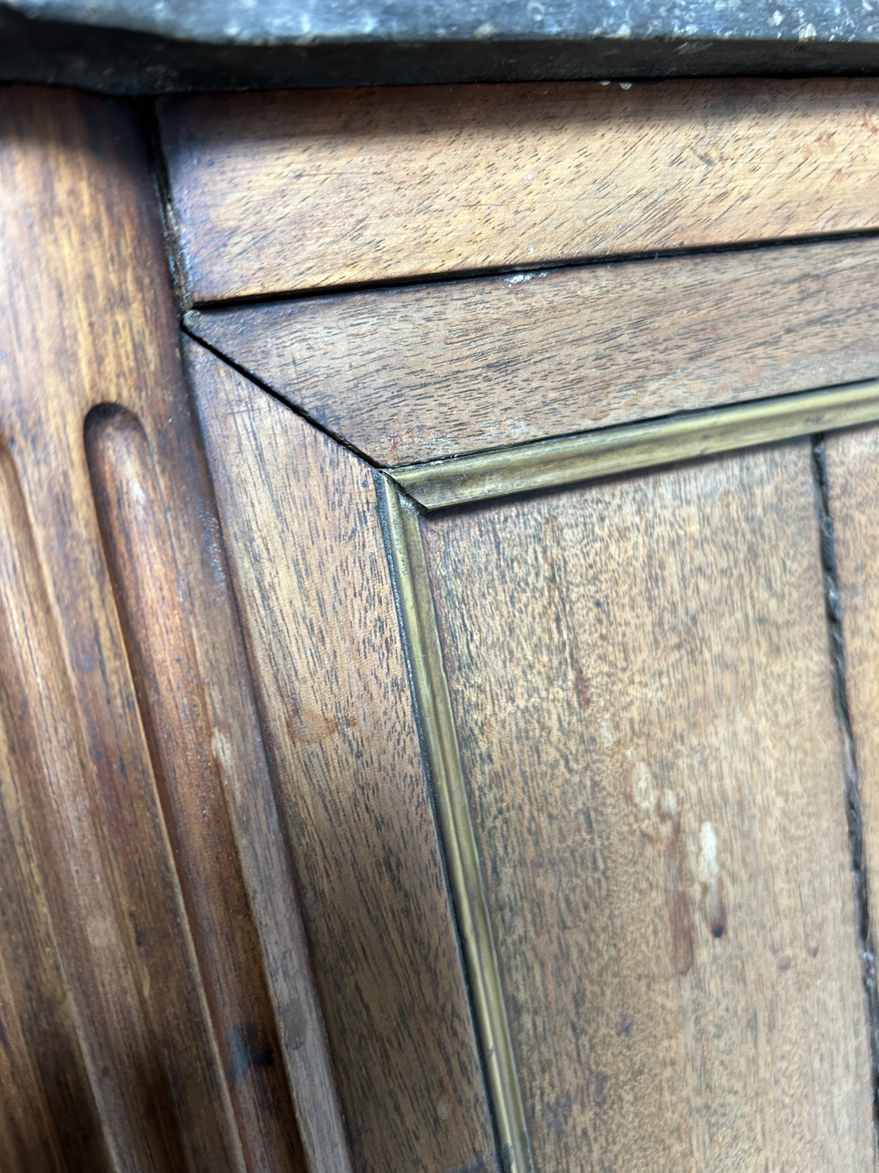 Mahogany and black marble chest of drawers, late 18th-early 19th century