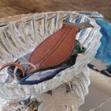 Chiseled glass pocket emptier