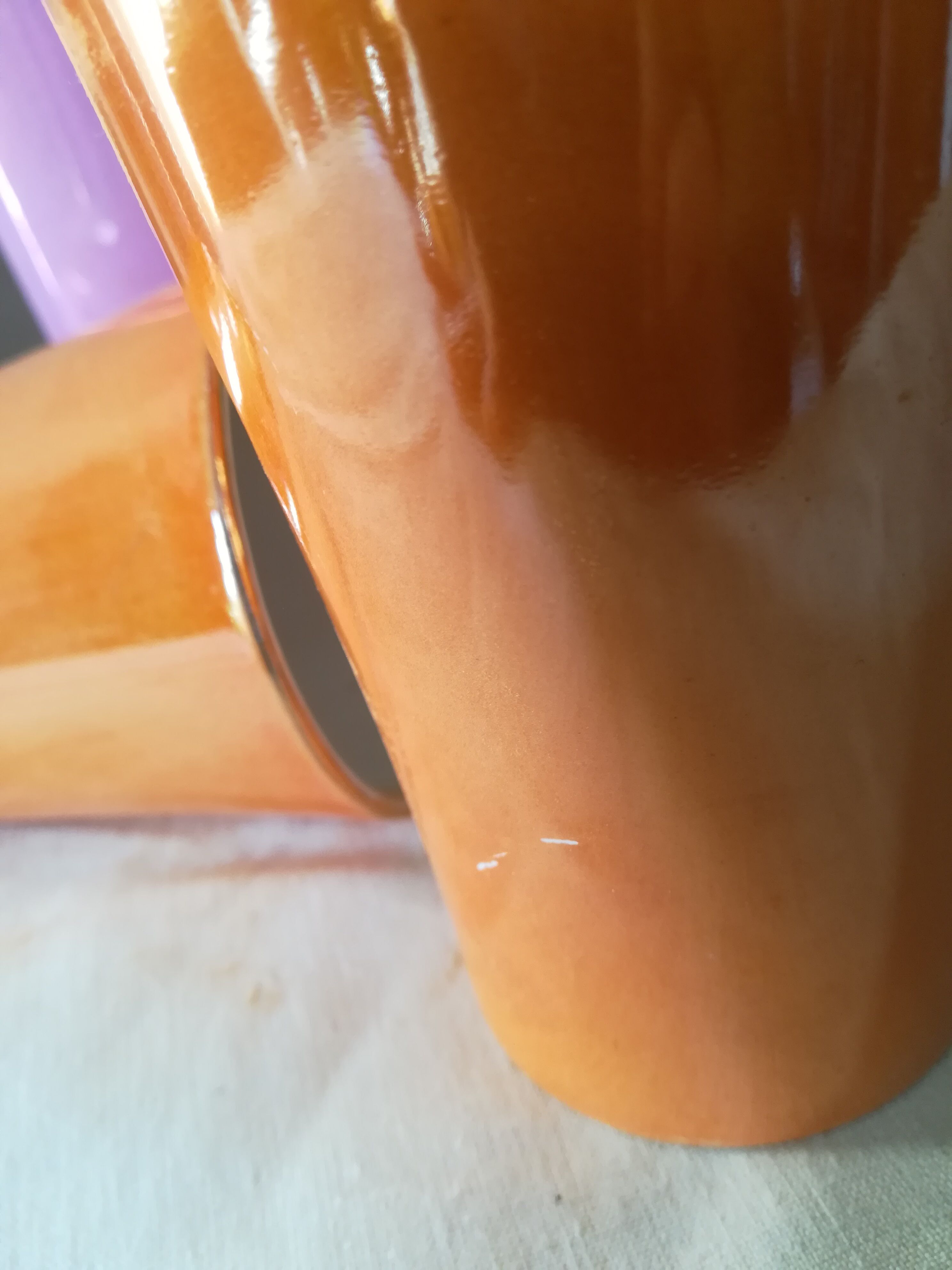 8 coloured cups in earthenware