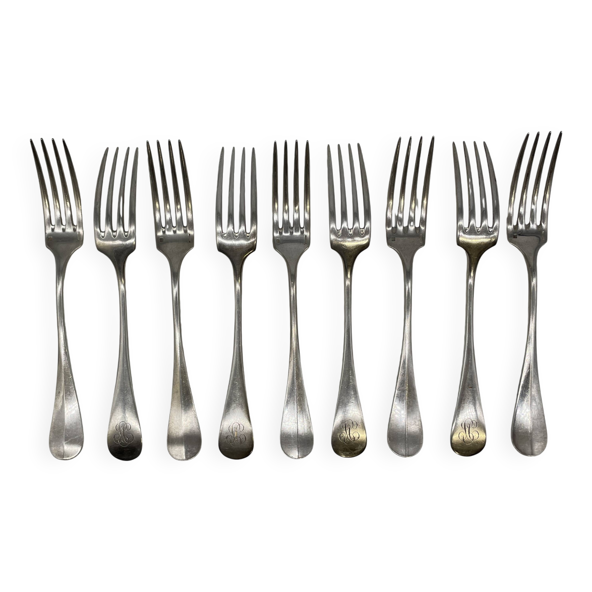 Set of 15 soup spoons and 9 lunch forks by Christofle.