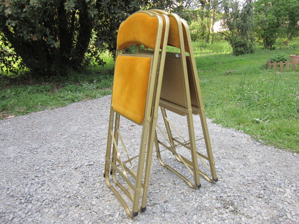 Série de 4 chaises pliantes métal doré et tissus