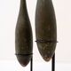 Pair of large wooden practice skittles on a base, early 20th century